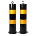 Two black and yellow poles with yellow stripes.